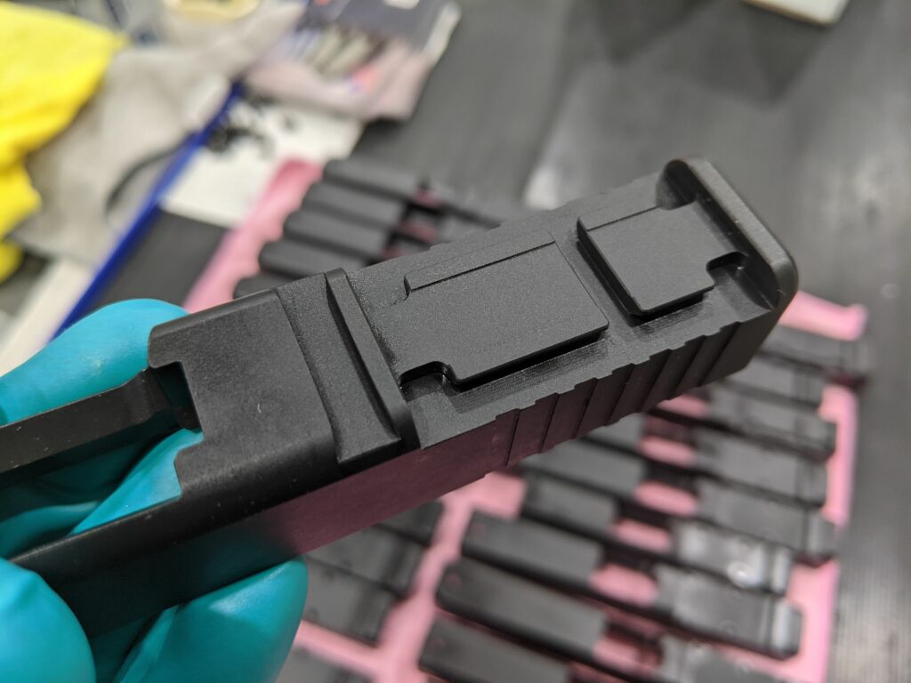 Black nitride refinished slide